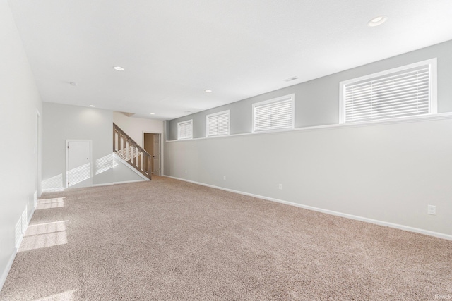 basement featuring carpet flooring