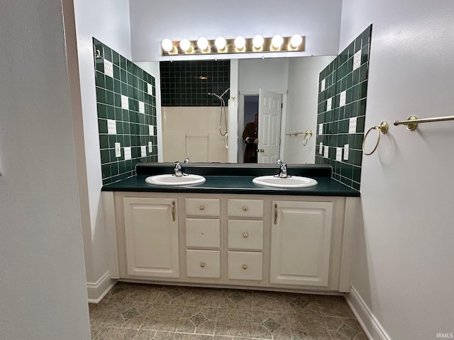 bathroom featuring vanity and a shower