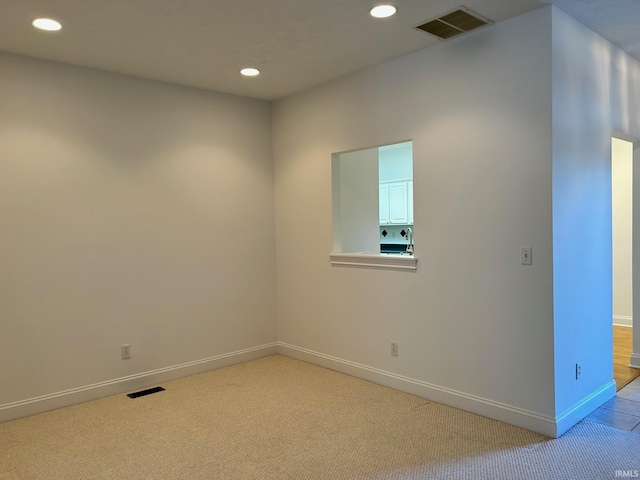 view of carpeted spare room