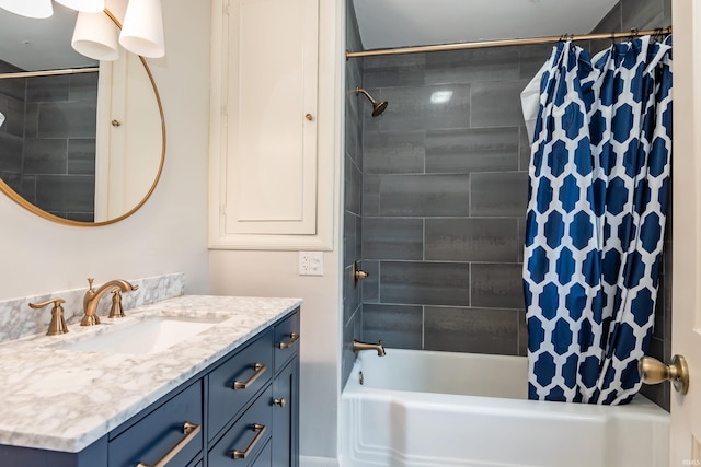 bathroom featuring vanity and shower / tub combo with curtain