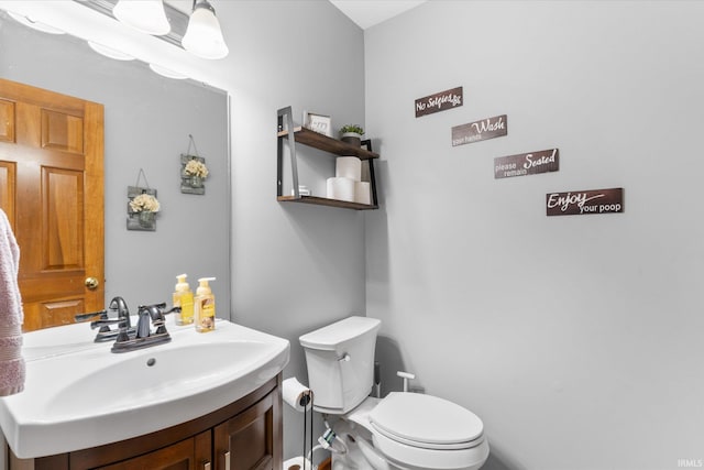 bathroom with sink and toilet