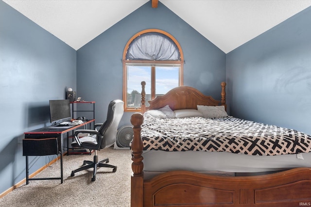 bedroom featuring lofted ceiling and carpet flooring