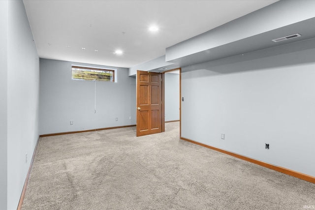 basement with light carpet