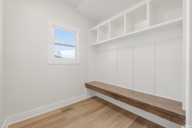 mudroom with hardwood / wood-style floors