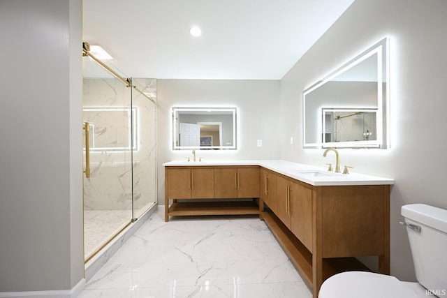 bathroom featuring an enclosed shower, vanity, and toilet