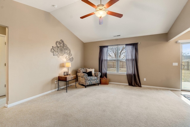 sitting room featuring ceiling fan, lofted ceiling, and carpet floors