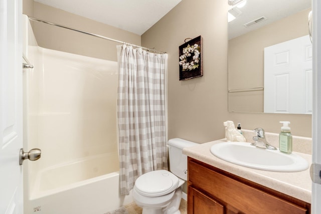 full bathroom featuring vanity, shower / bath combination with curtain, and toilet