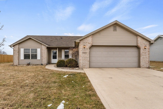 single story home featuring a garage and a front yard