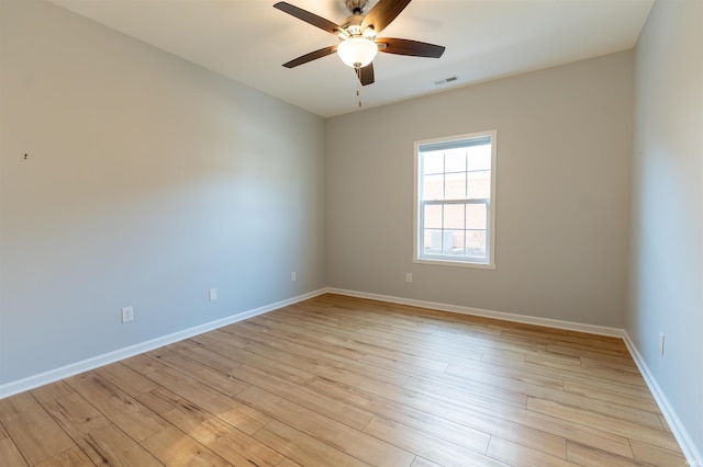 unfurnished room featuring light hardwood / wood-style floors and ceiling fan