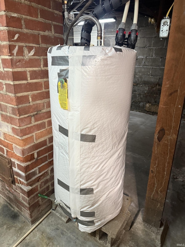 utility room with water heater