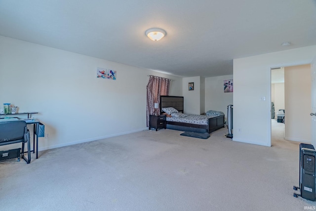 bedroom with light colored carpet