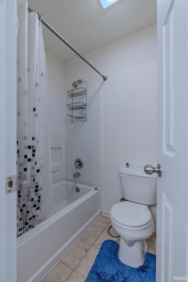 bathroom with shower / bath combination with curtain and toilet