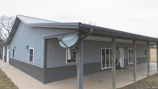 view of property exterior featuring a patio