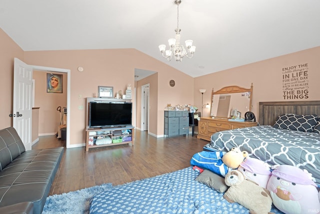 bedroom with lofted ceiling, hardwood / wood-style flooring, and a chandelier