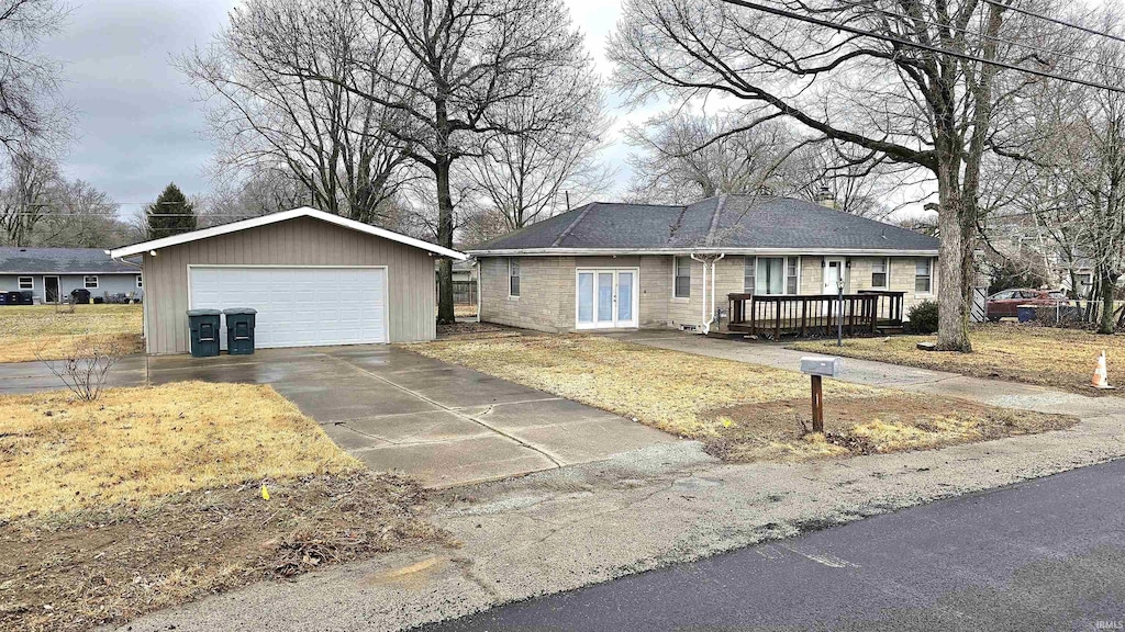 single story home with a wooden deck