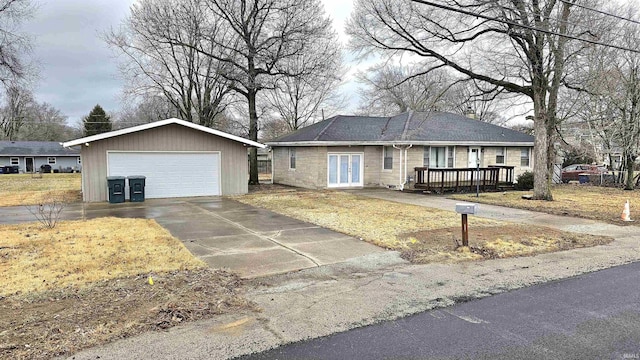 single story home with a wooden deck