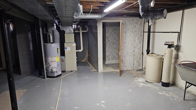 basement with gas water heater and heating unit