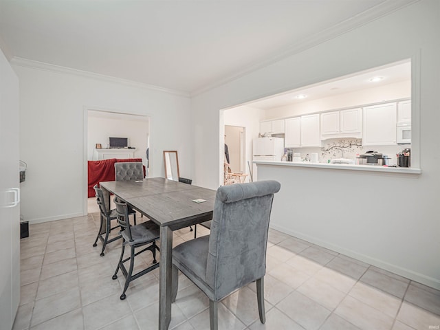 tiled dining space with crown molding