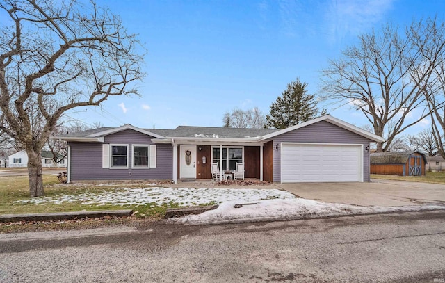 ranch-style house featuring a garage