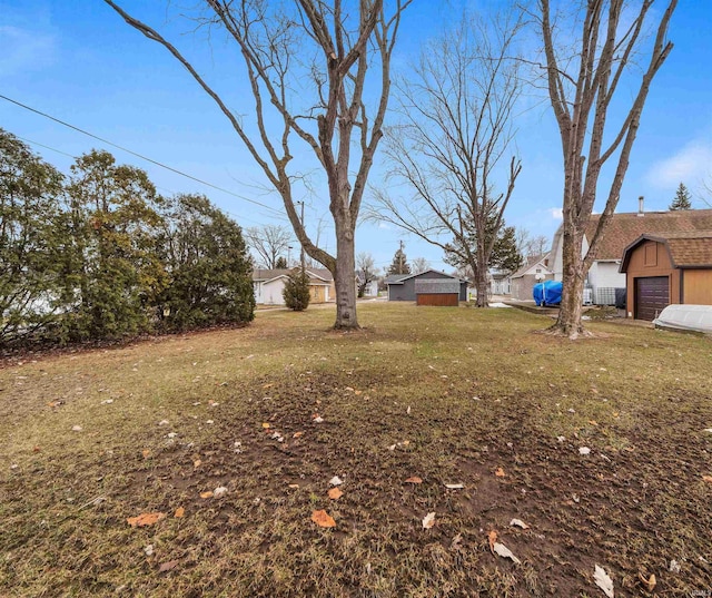 view of yard with a garage