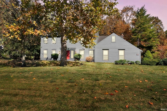 view of front of home featuring a yard