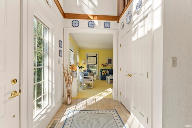 entryway featuring light tile patterned flooring