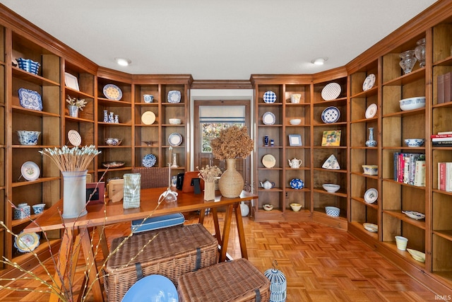 office space with light parquet flooring