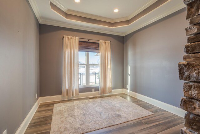 581 Silverdale Rd, Rockport, IN 47635 - empty room featuring crown molding, wood-type flooring, and a tray ceiling