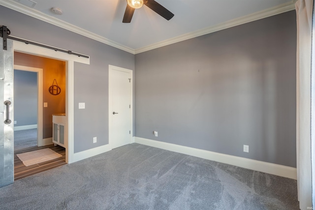 581 Silverdale Rd, Rockport, IN 47635 - unfurnished bedroom with crown molding, carpet flooring, a barn door, and ceiling fan