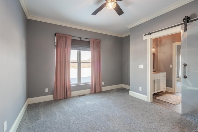 581 Silverdale Rd, Rockport, IN 47635 - spare room featuring crown molding, ceiling fan, a water view, light colored carpet, and a barn door