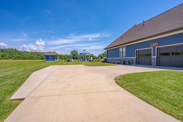 581 Silverdale Rd, Rockport, IN 47635 - view of home's community with a garage and a lawn