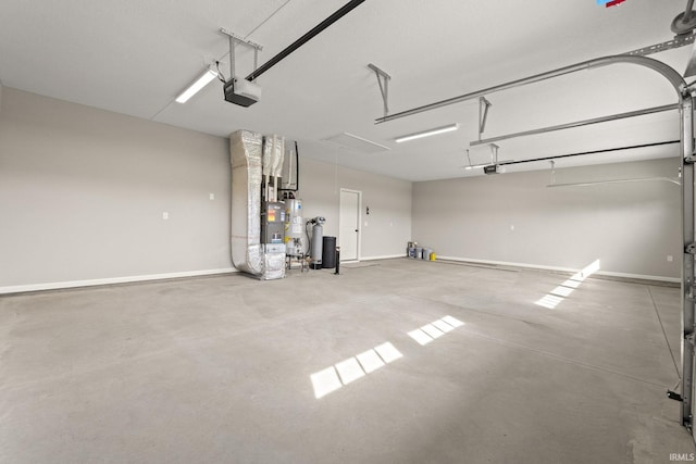 garage featuring a garage door opener and gas water heater