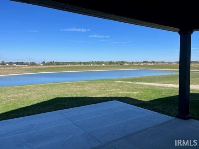 view of yard with a water view