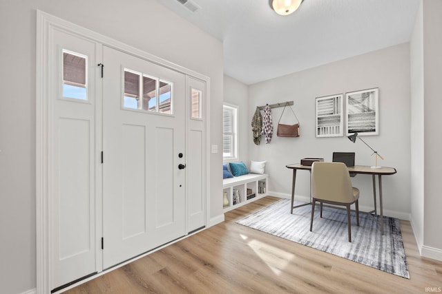 foyer featuring light wood-type flooring