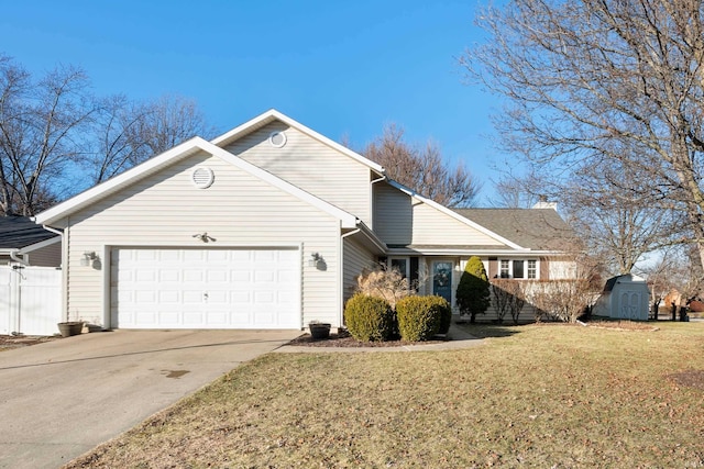 view of front of house with a garage and a front lawn