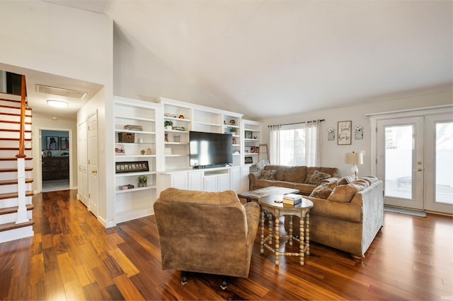 living room featuring french doors, dark hardwood / wood-style floors, and vaulted ceiling