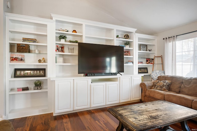 living room with lofted ceiling and dark hardwood / wood-style flooring