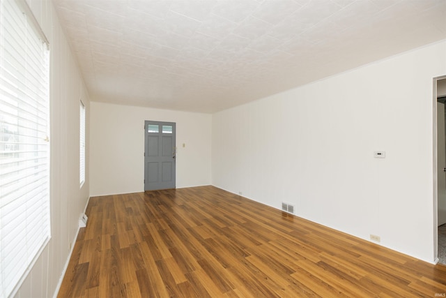 empty room featuring hardwood / wood-style floors