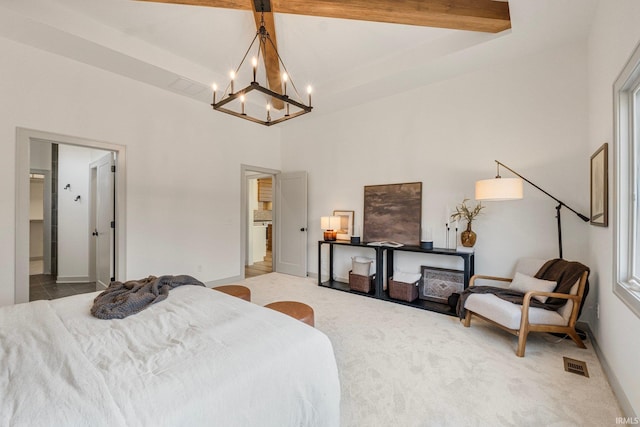 bedroom featuring carpet, a towering ceiling, a chandelier, and beam ceiling