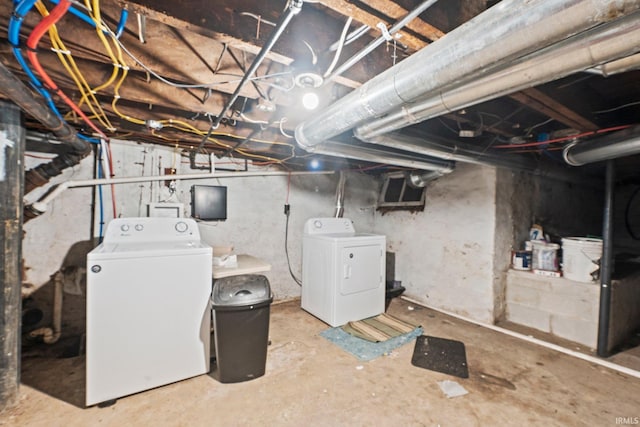 basement featuring independent washer and dryer