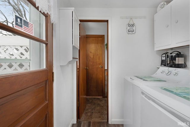 laundry room with washer and dryer, dark wood-type flooring, and cabinets