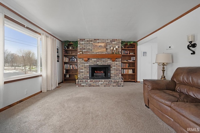 carpeted living room with a brick fireplace and ornamental molding