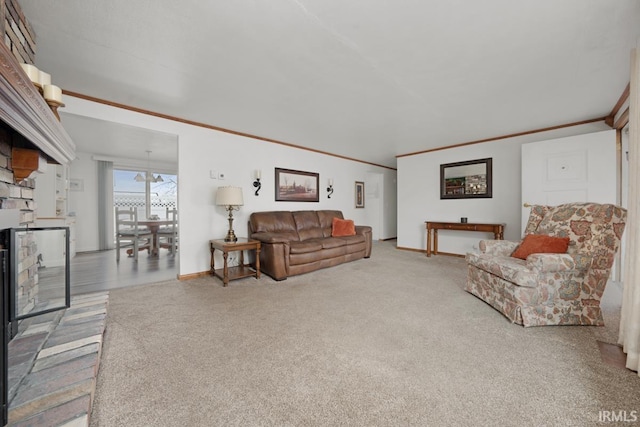 carpeted living room with ornamental molding