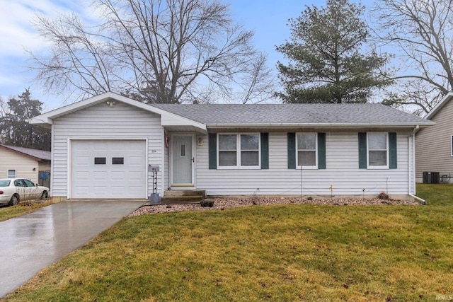 ranch-style home with a garage, a front lawn, and central air condition unit