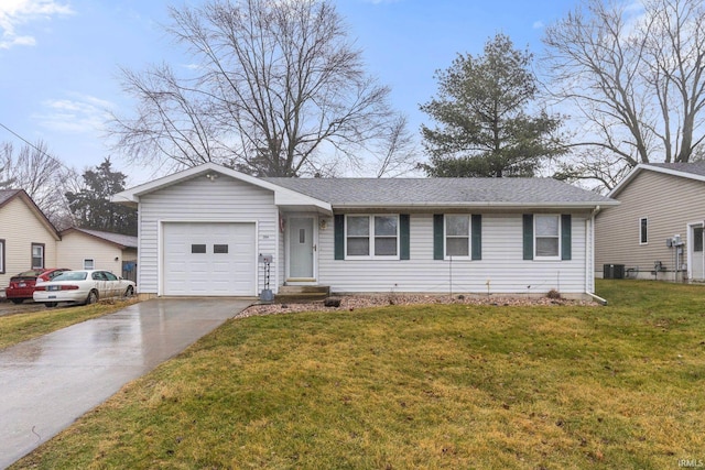 ranch-style home with cooling unit, a garage, and a front yard