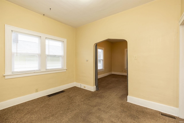 view of carpeted spare room