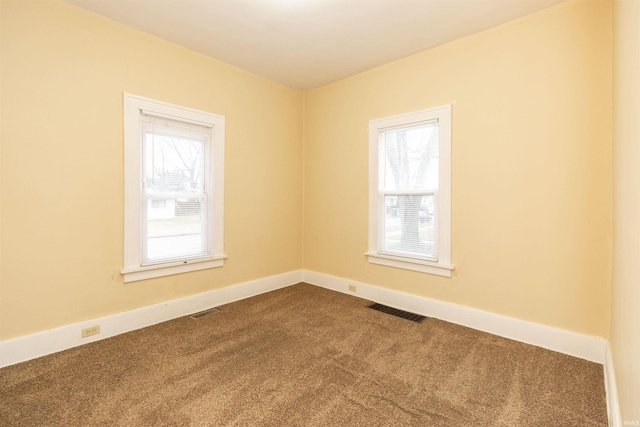 empty room with carpet floors