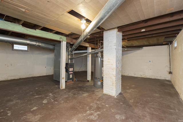 basement with heating unit and water heater