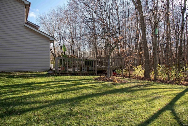 view of yard with a deck