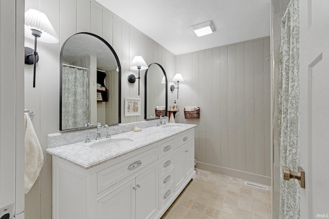 bathroom featuring vanity